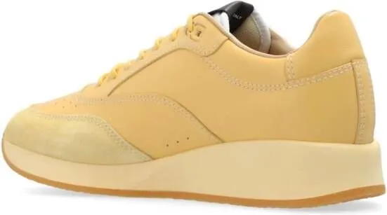 Jacquemus panelled lace-up sneakers Yellow