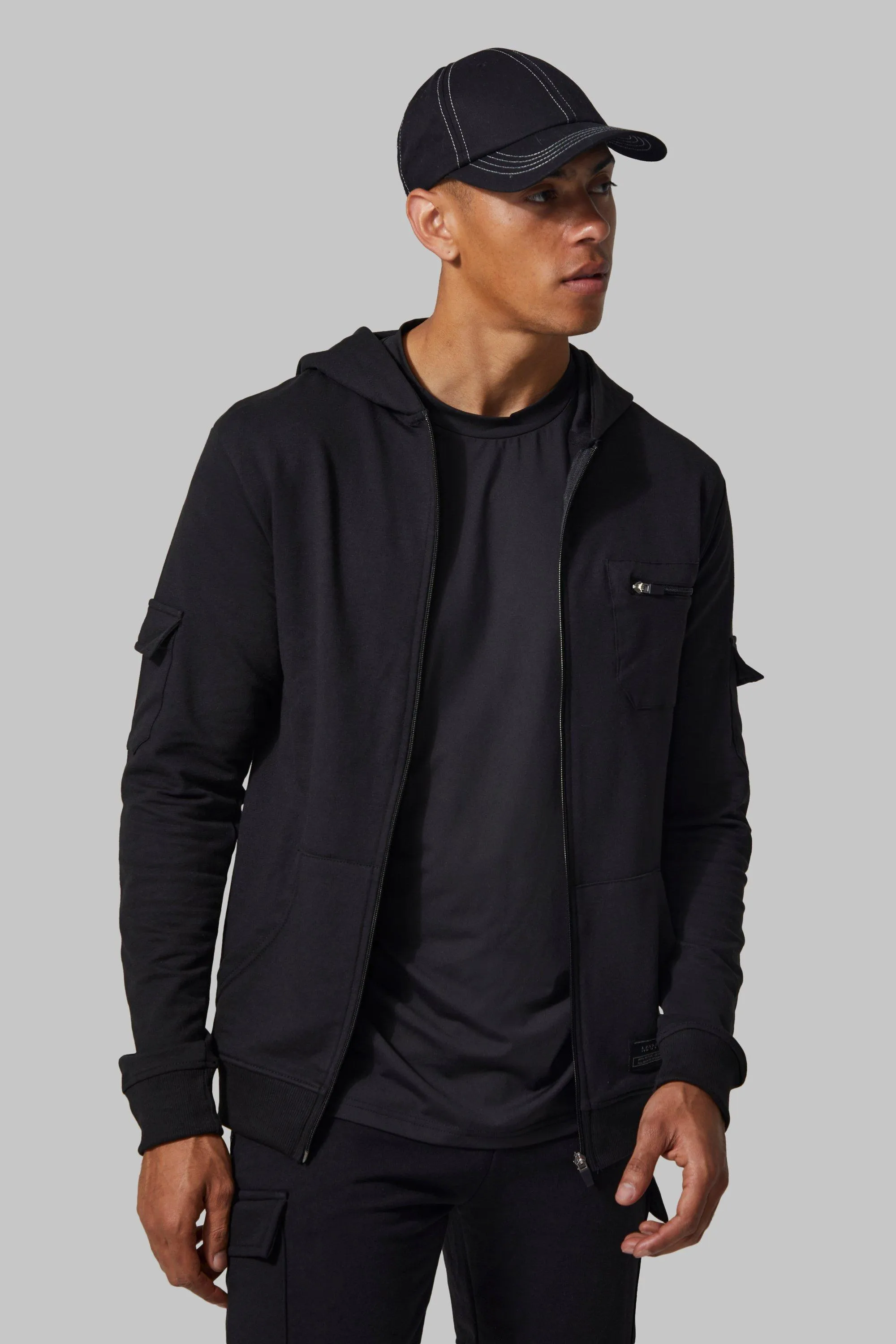 Man Active Muscle Fit Zip Cargo Hoodie | boohooMAN UK