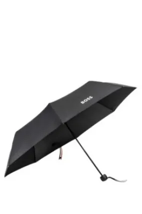 Mini umbrella with signature-stripe closing strap